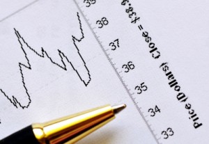 Fluctuating Stock Market Graph with Pen & scale