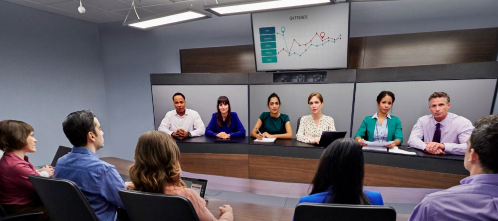 Polycom Immersive Studio Flex with 12 people in conference, 3 screens and data