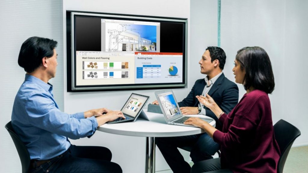 Polycom Pano with laptops in huddle room